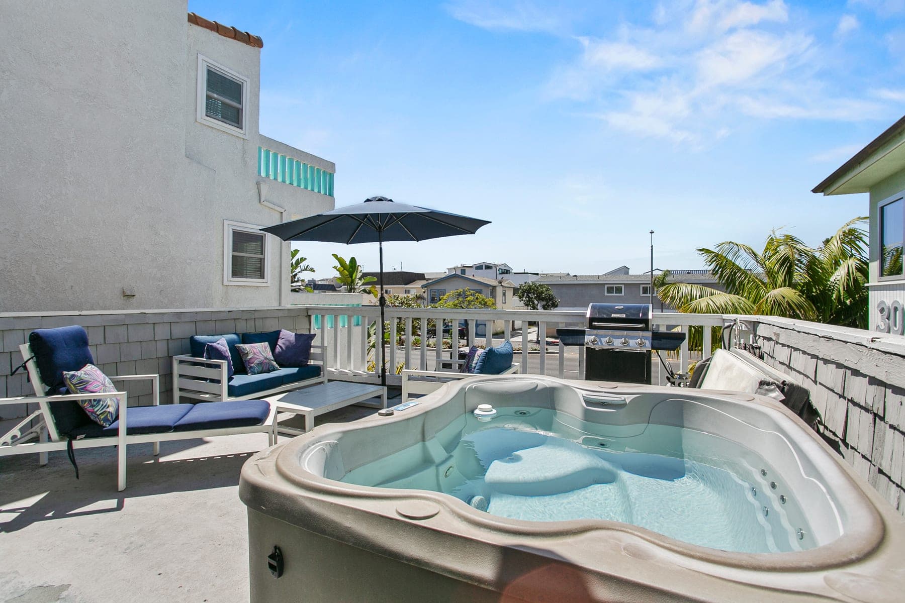 Private deck with hot tub and outdoor seating